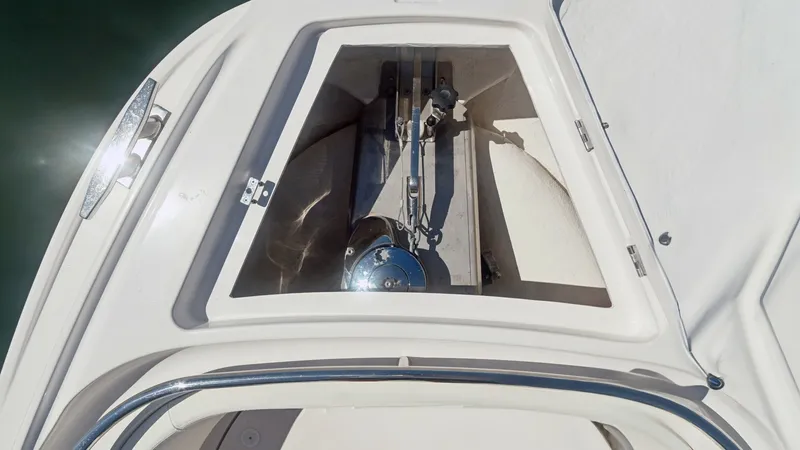 Slide: The Image of Bow Anchor Locker Access This image shows the bow anchor locker of the Zar Formenti 85 SL, featuring a neatly organized anchor storage area. The locker is spacious and designed for easy access, ensuring efficient deployment and retrieval of the anchor. The clean, well-maintained - 7766832