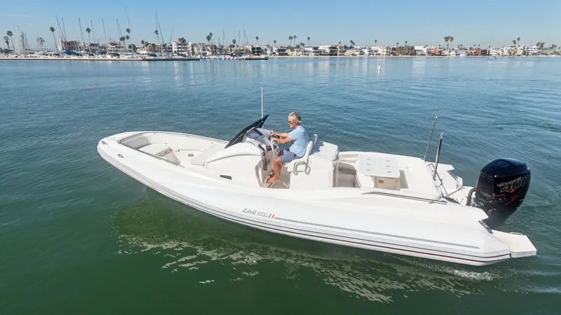 Slide: The Image of Side View of Zar Formenti 85 SL The 2017 Zar Formenti 85 SL showcases a sleek and modern design with its streamlined hull, perfect for both leisure and speed. The spacious deck includes comfortable seating, ideal for entertaining guests or enjoying a relaxing day on the water. Its power - 7766834