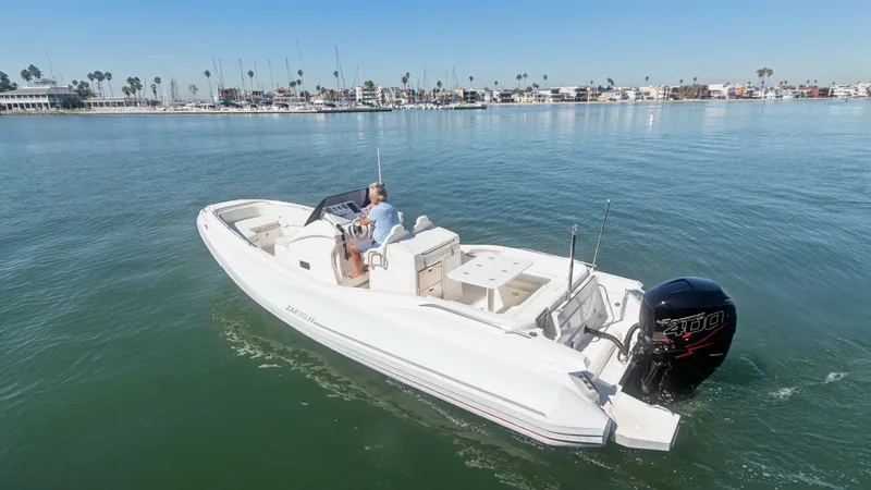 Slide: The Image of Aerial View of Aft Deck This image showcases the sleek and spacious aft deck of the 2017 Zar Formenti 85 SL. The deck features comfortable seating and a centrally positioned console, ideal for leisurely cruising. The powerful outboard engine promises excellent performance, while - 7766833