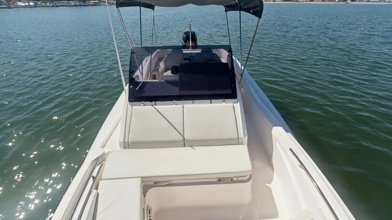 Slide: The Image of Spacious Bow Seating Area The Zar Formenti 85 SL features a spacious bow seating area, ideal for relaxation and socializing. The elegant design includes comfortable cushioned seating and ample space, perfect for enjoying the open water views. The sleek lines and modern canopy prov - 7766822