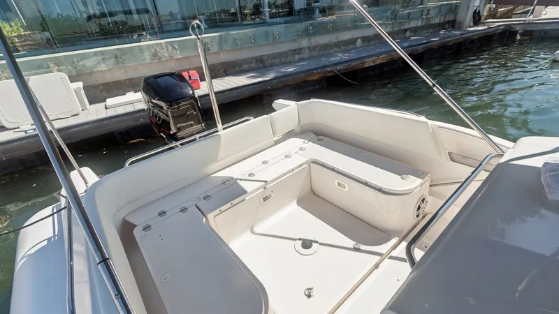 Slide: The Image of Spacious Aft Deck Seating Area The aft deck of the 2017 Zar Formenti 85 SL features a spacious seating area, perfect for socializing and relaxation. The layout includes comfortable, cushioned benches with ample storage underneath, enhancing functionality. The clean, modern design is co - 7766825