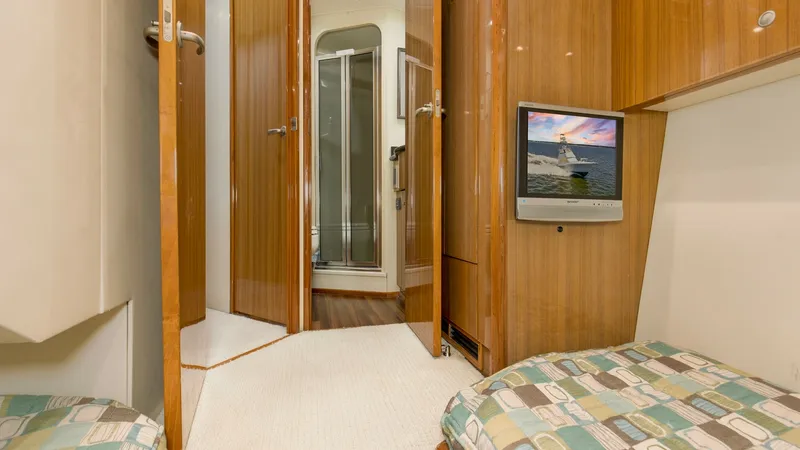 Slide: The Image of 2007 64 Viking Enclosed Bridge Reel Blues Rear Starboard Stateroom (2) - 7795332