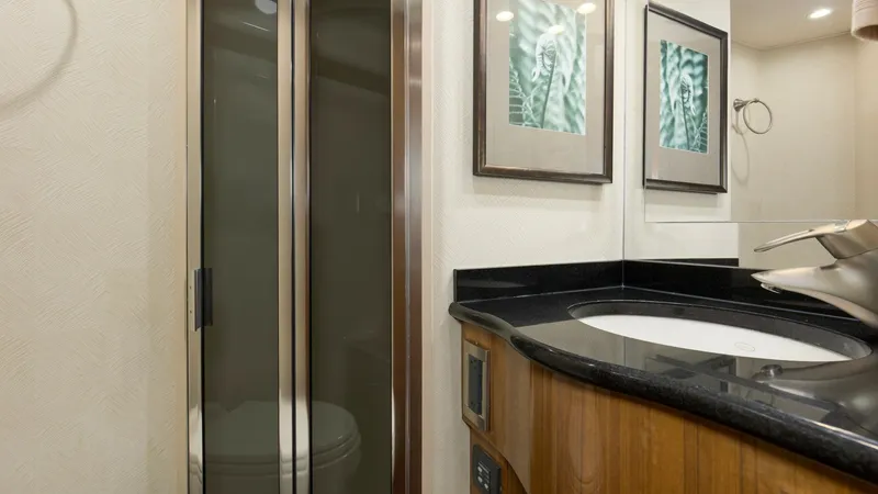 Slide: The Image of 2007 64 Viking Enclosed Bridge Reel Blues Rear Starboard Stateroom Head - 7795334
