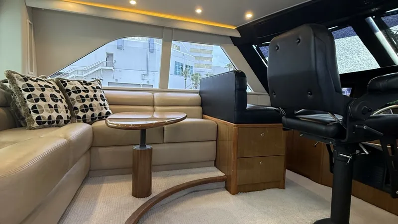 Slide: The Image of 2007 64 Viking Enclosed Bridge Reel Blues Bridge Aft Seating - 7795337