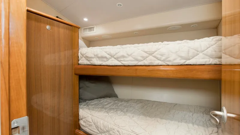 Slide: The Image of 2007 64 Viking Enclosed Bridge Reel Blues Forward Starboard Stateroom - 7795327