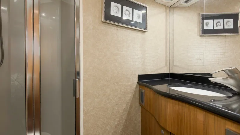 Slide: The Image of 2007 64 Viking Enclosed Bridge Reel Blues Forward Stateroom Head - 7795331