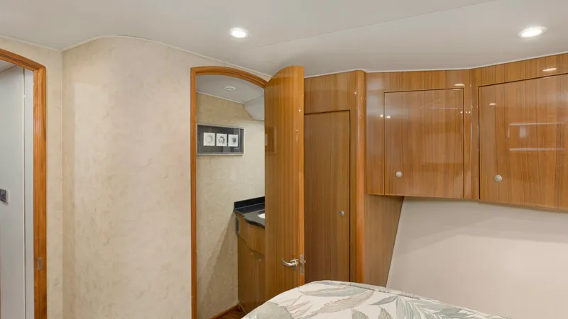 Slide: The Image of 2007 64 Viking Enclosed Bridge Reel Blues Forward Stateroom (3) - 7795329