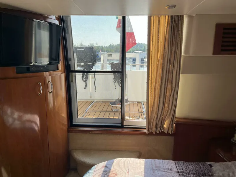 Slide: The Image of 2003 Carver 444 Cockpit Motor Yacht 44 - 7828311