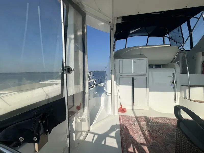 Slide: The Image of 2003 Carver 444 Cockpit Motor Yacht 44 - 7828275