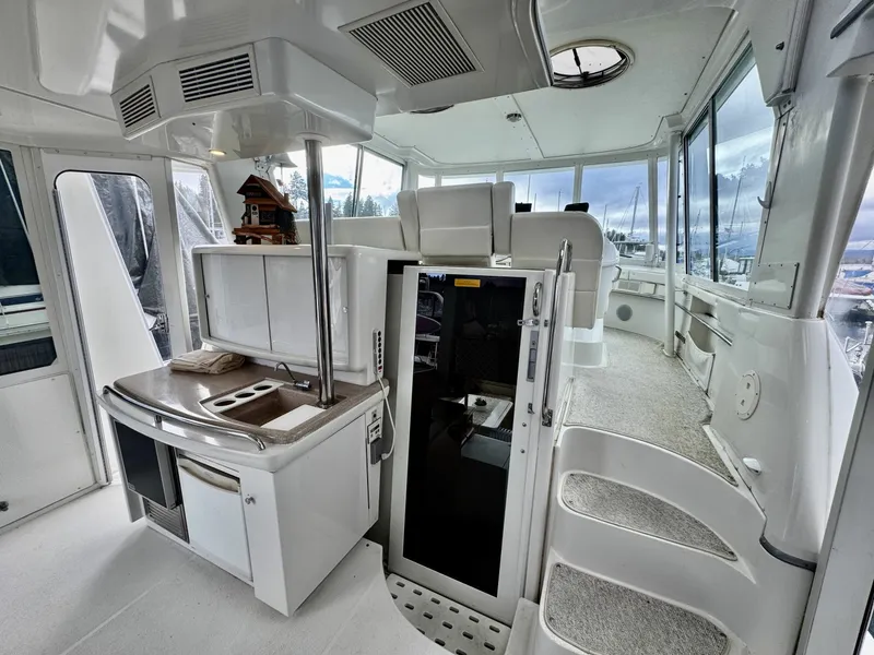 Slide: The Image of 1997 Carver 500 Cockpit Motor Yacht 50 - 7828394