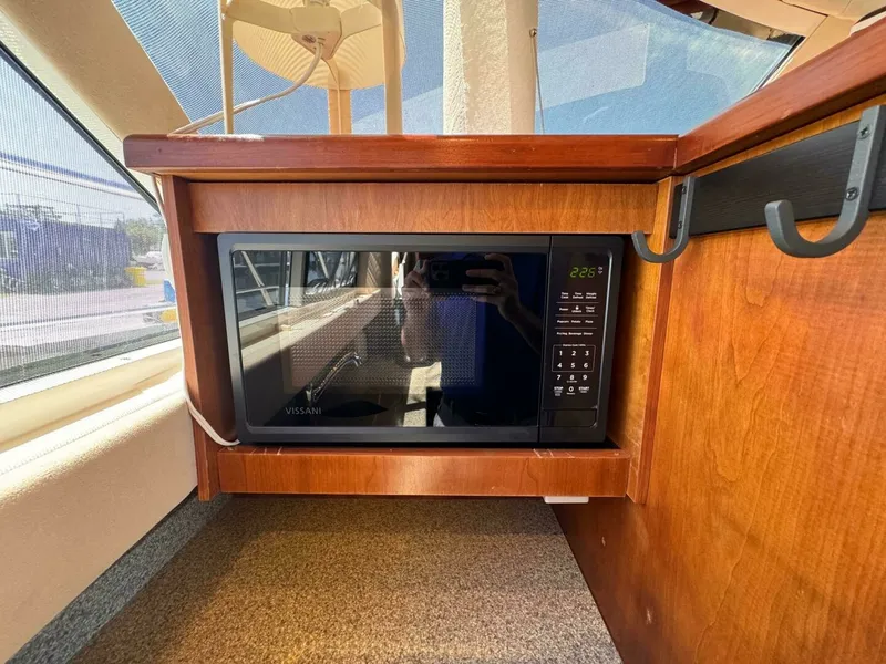 Slide: The Image of 2002 Cruisers Yachts 4450 Express Motor Yacht 45 - 7828485