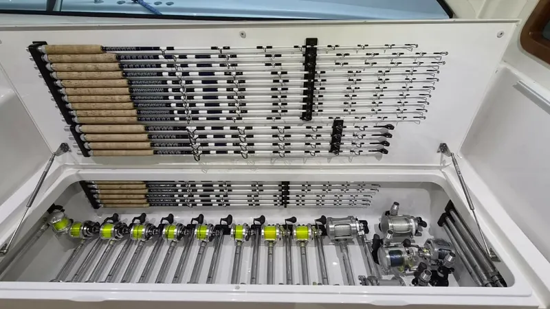Slide: The Image of Fishing Rod Storage Compartment This 2020 Viking 46 BF features a meticulously organized fishing rod storage compartment, designed to keep your gear secure and easily accessible. The compartment showcases an array of neatly arranged rods and reels, highlighting the yacht's dedication to - 7854745