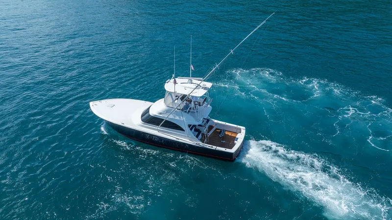 Slide: The Image of Aerial View of Flybridge and Aft Deck This aerial shot of the 2020 Viking 46 BF showcases its sleek flybridge and spacious aft deck. The flybridge offers excellent visibility and control, ideal for both cruising and sportfishing. The aft deck features ample space for fishing gear, complemente - 7854780