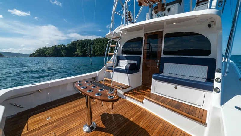 Slide: The Image of Spacious Aft Deck with Seating The aft deck of the 2020 Viking 46 BF offers a spacious and inviting area for relaxation and entertainment. Featuring comfortable seating with plush cushions and a beautifully crafted teak deck, this space is perfect for enjoying the sea views. The additi - 7854760