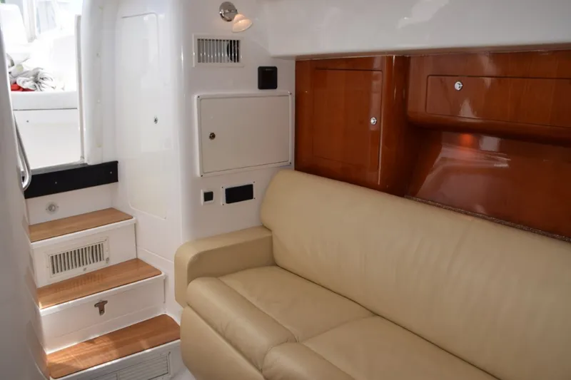 Slide: The Image of Cabin Entry Steps With Wood Treads, Hanging Locker To Port, Fusion Stereo Base And Seakeeper Displays - 7925285