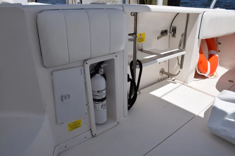 Slide: The Image of Fresh Water Shower Station Next To Fire Extinguisher And Closed Dive Door - 7925296