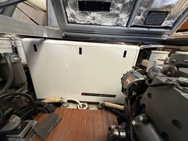 Slide: The Image of Engine Room Bulkhead & Systems Detailed view of engine compartment bulkhead and wiring/plumbing systems. - 7926293