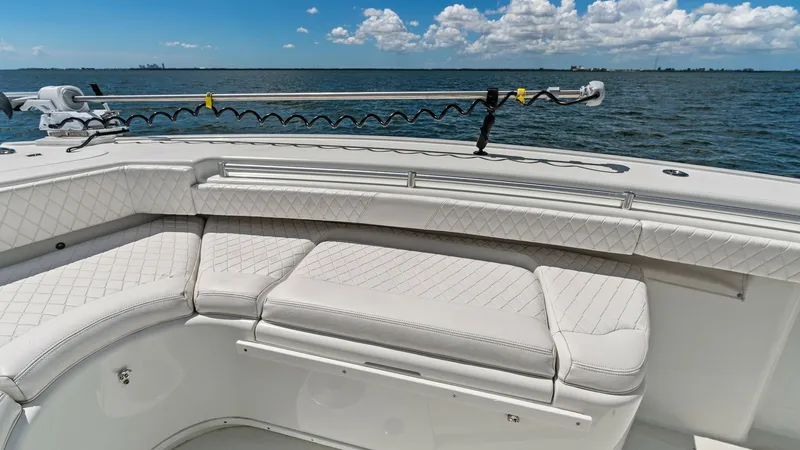 Slide: The Image of Spacious Bow Seating Area The 2014 Yellowfin 39 Center Console features an inviting bow seating area with plush, diamond-stitched upholstery, offering comfort and style. The ample seating is ideal for relaxing while enjoying panoramic views of the open water. This area is perfect - 7943332