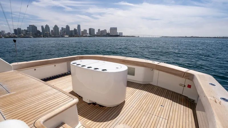 Slide: The Image of 2014 Viking 76 Enclosed Bridge "TRANQUILO" The spacious cockpit of the 2014 Viking 76 Enclosed Bridge Sportfisher features exquisite teak decking, providing a luxurious and durable surface for fishing or entertaining. A built-in livewell adds functionality, while the sweeping ocean views and city - 7962509
