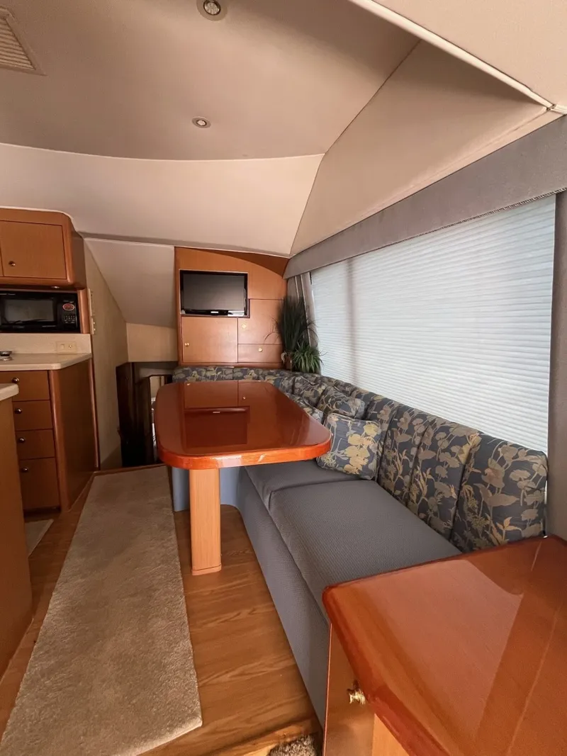 Slide: The Image of Dinette area on the 2004 Ocean Yachts 52 Super Sport - 8036712