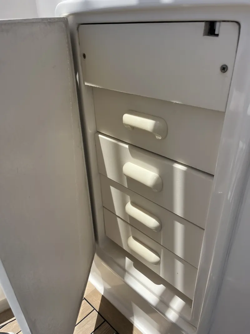 Slide: The Image of Cockpit Storage on the 2004 Ocean Yachts 52 Super Sport - 8036674