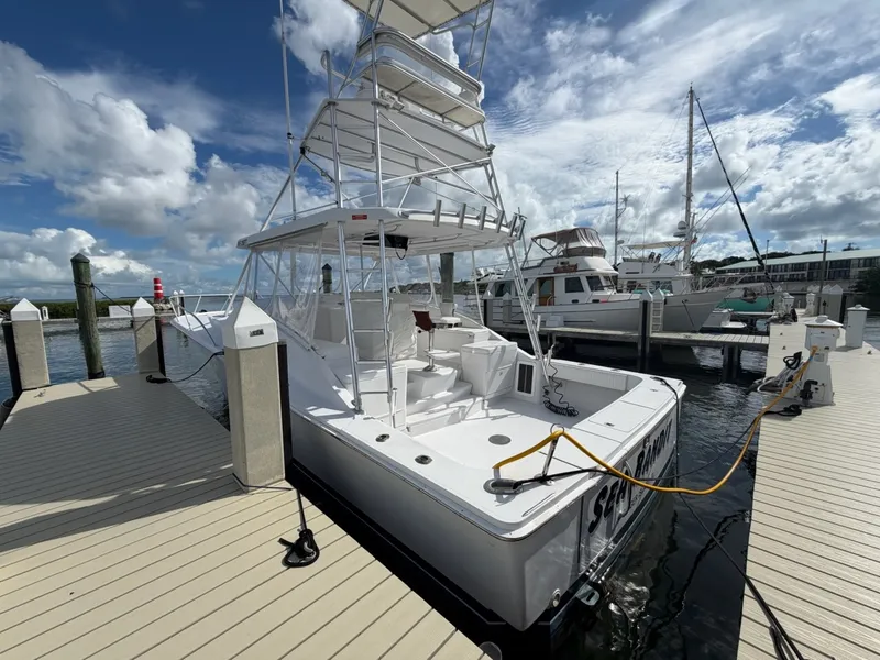 Slide: The Image of 40 Open Luhrs docked at a marina - 8064861