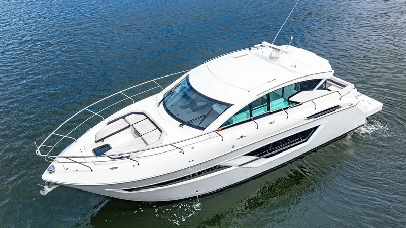 Slide: The Image of Aerial View of Cantius 46 Bow The 2019 Cantius 46 by Cruisers Yachts showcases a sleek, modern design with a spacious bow area. Elegant railings and a plush sunpad provide a luxurious space for relaxation. Large windows and a streamlined profile enhance both aesthetics and performance - 8141295
