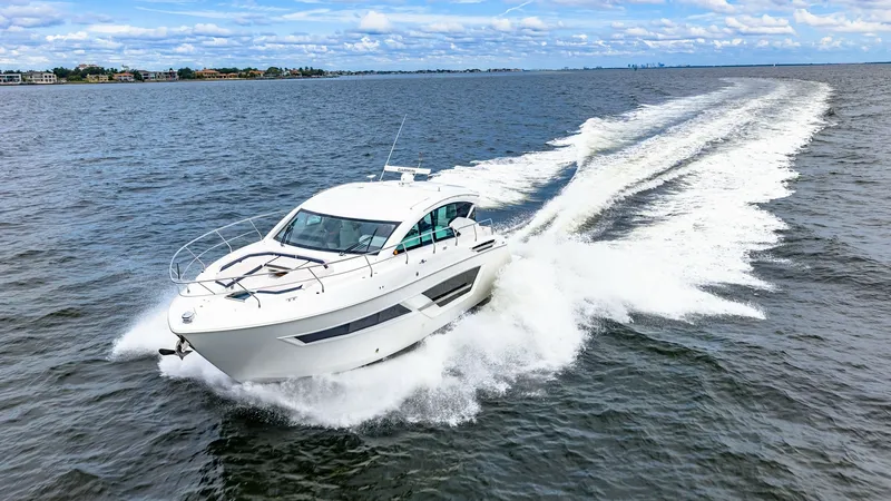 Slide: The Image of Cruisers Yachts Cantius 46 in Motion The 2019 Serenity glides effortlessly across the water, showcasing its sleek design and robust performance. This Cruisers Yachts Cantius 46 model features modern lines and a spacious deck, perfect for both leisurely cruises and high-speed adventures. Its - 8141326