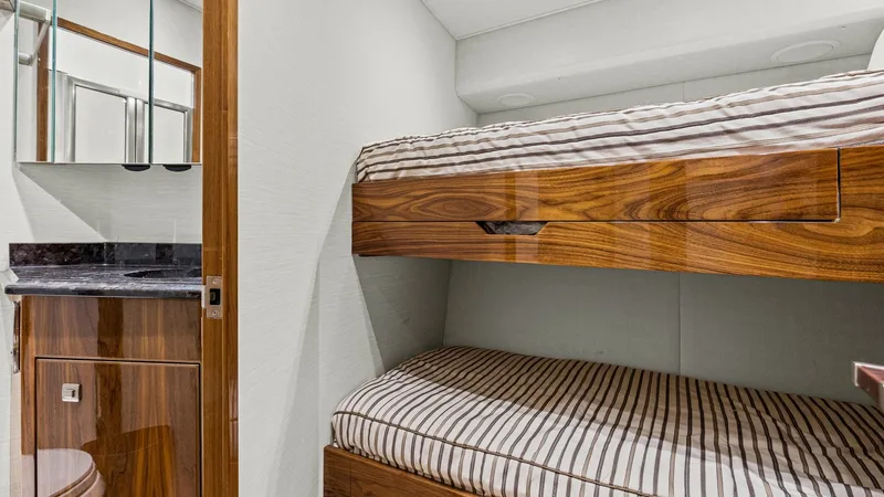 Slide: The Image of 2017 72 Viking Enclosed Bridge Share-E Port Stateroom and Head (2) - 8087235
