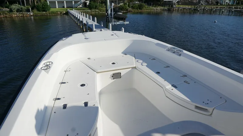 Slide: The Image of Spacious Bow Seating Area The bow of the 2016 Boston Whaler 270 Dauntless features a versatile seating area with ample space for relaxation. The clean, white finish and well-designed layout provide comfort and style, ideal for both leisure cruising and fishing. The sturdy construc - 8087578
