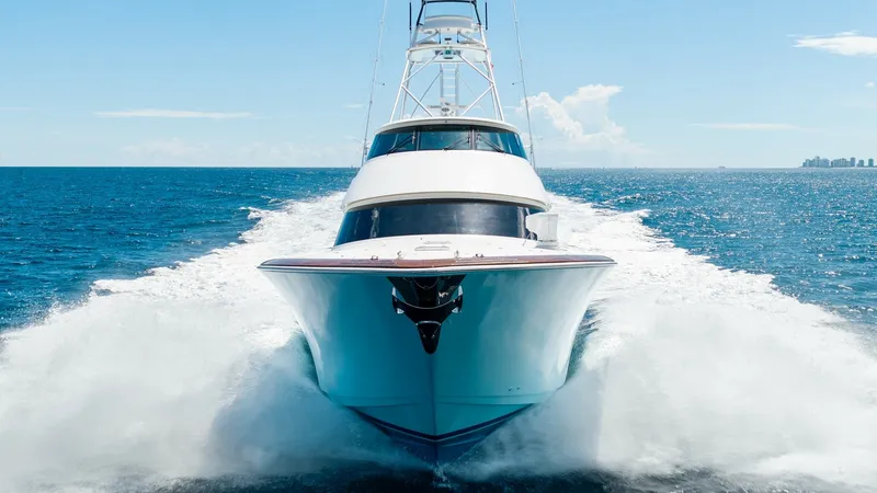 Slide: The Image of Dynamic Bow View in Motion Experience the thrilling power of the 2017 Viking 92 Enclosed Bridge as it cuts through the water. This striking bow view showcases the vessel's sleek lines and robust design, emphasizing its performance and elegance. The enclosed bridge offers enhanced p - 8439652