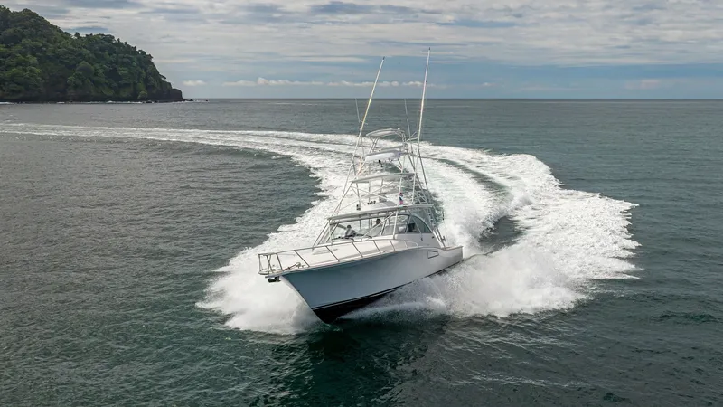 Slide: The Image of Dynamic Bow View Underway Experience the exhilarating performance of the 2020 Cabo 40 Express as it navigates the open waters with precision and power. The sleek bow cuts effortlessly through the waves, showcasing the vessel's robust design and advanced engineering. The yacht's co - 8511615