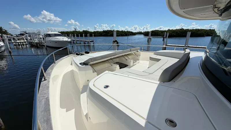 Slide: The Image of Spacious Bow Lounge Area Experience the open-air luxury of the Absolute Navetta 58's bow lounge. Designed for relaxation, this area features plush seating and ample space, perfect for enjoying panoramic views. The sleek lines and modern design enhance the vessel's aesthetic, offe - 8640152