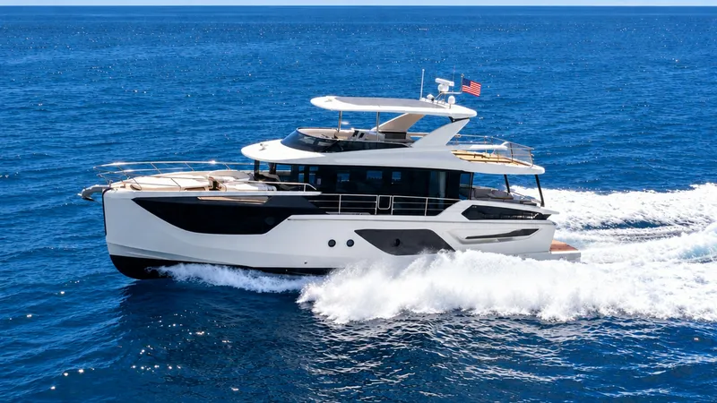 The Image of Side Profile of Absolute Navetta 58 The 2026 Absolute Navetta 58 showcases a sleek and modern design, cutting through the water effortlessly. Its expansive windows and streamlined hull offer both style and functionality, enhancing visibility and performance. The flybridge and open deck spac - 8640107