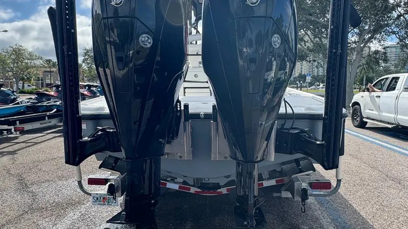 Slide: The Image of Twin Outboard Engines - Stern View This image showcases the powerful twin outboard engines of the 2023 SeaVee 270Z, emphasizing its performance capabilities. The sleek design and robust construction ensure optimal propulsion and efficiency on the water. Ideal for those seeking a blend of s - 8398133