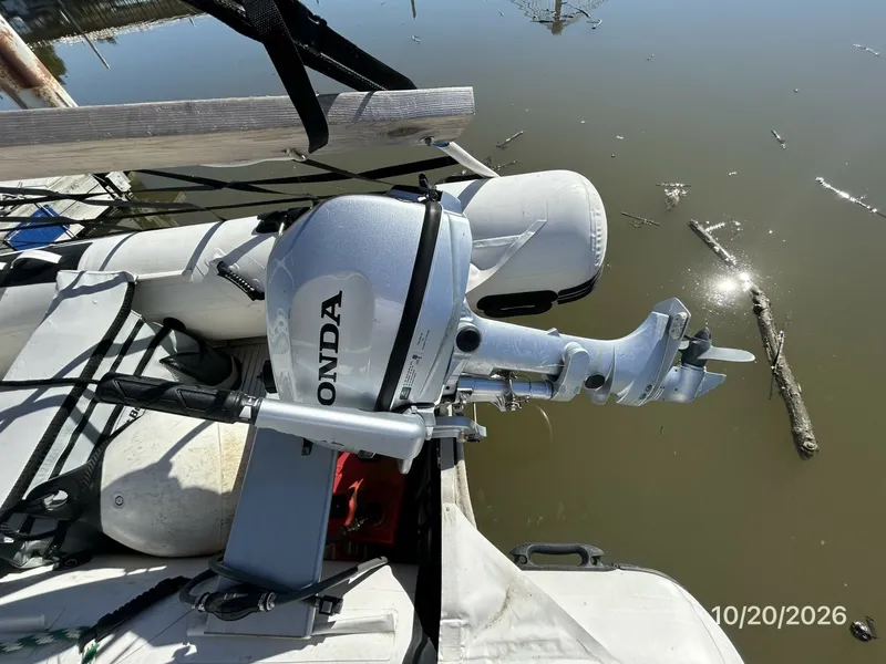 Slide: The Image of Meridian 441 tender outboard - 8598524