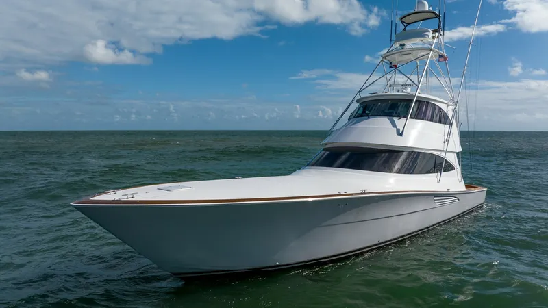 Slide: The Image of Bow View of Viking 68 Enclosed Bridge The sleek bow of the 2019 Viking 68 Enclosed Bridge cuts gracefully through the water, showcasing its aerodynamic design and superior craftsmanship. The elegant lines and robust build highlight Viking's commitment to performance and luxury. This vessel's - 8738087