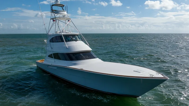Slide: The Image of Bow View with Enclosed Bridge This stunning 2019 Viking 68 Enclosed Bridge showcases a sleek and aerodynamic bow, cutting through the water with precision. The enclosed bridge offers enhanced visibility and protection, perfect for navigating in various weather conditions. Elegant line - 8738085