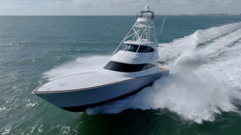 The Image of Dynamic Bow View in Motion Experience the power and elegance of the 2019 Viking 68 Enclosed Bridge as it cuts through the waves with precision. The sleek, aerodynamic design showcases its advanced hull engineering, ensuring both performance and style. The elevated bridge and robust - 8738008