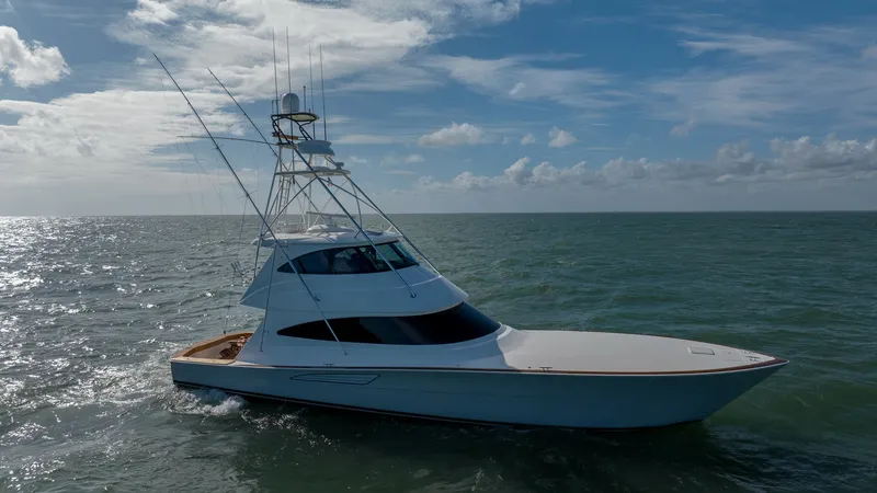Slide: The Image of Viking 68 Enclosed Bridge Exterior The 2019 Viking 68 Enclosed Bridge, Sandman, showcases a sleek, aerodynamic profile with a robust tower for optimal visibility. Its expansive deck and elegant lines are designed for both performance and luxury, gliding smoothly over the open sea. The encl - 8738092