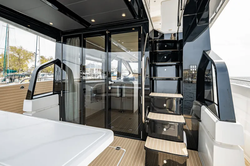 Slide: The Image of Cruisers Yachts 57 FLY 2025 - 59