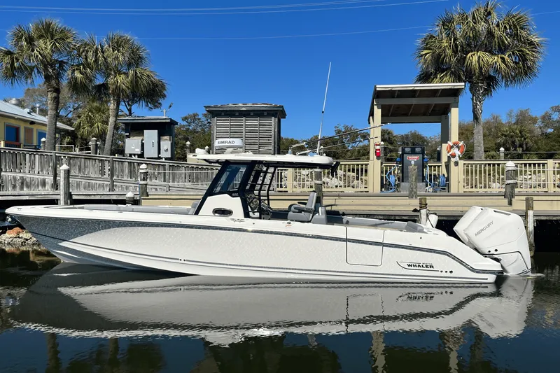 Slide: The Image of Boston Whaler 330 Outrage 2025 - 2