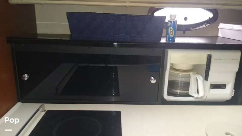 Slide: The Image of Storage And Coffee Maker Built In - 12193696