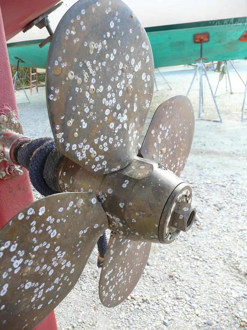 Slide: The Image of Close-up of a barnacle-covered propeller on a 1991 Island Packet 38 sailboat. - 25