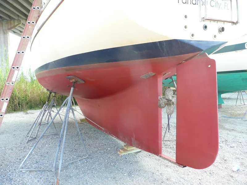 Slide: The Image of 1991 Island Packet 38 sailboat hull and rudder on stands, Panama City, FL. - 27