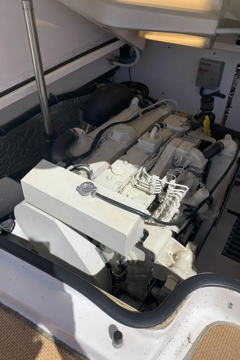 Slide: The Image of Engine compartment of a 2004 Tiara Yachts 3600 Sovran, showcasing mechanical components. - 47