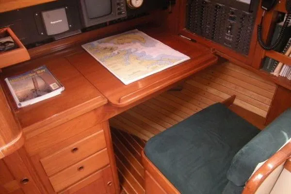 Slide: The Image of Navigation station in 1988 Alden 46 yacht with map and equipment. - 13