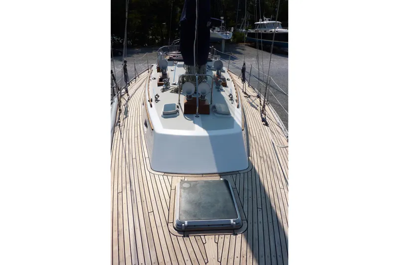 Slide: The Image of 1988 Alden 46 sailboat deck with wooden finish and modern fittings. - 4