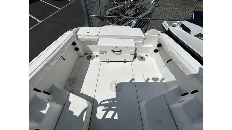 Slide: The Image of 2005 Seaswirl Striper 2301 Dual Console O/B boat interior, spacious seating area. - 8