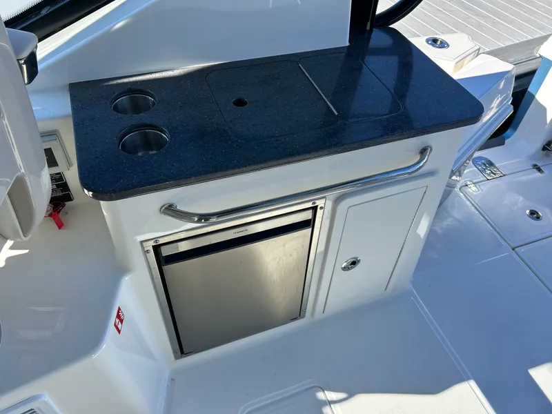 Slide: The Image of Boston Whaler 325 Conquest 2026 - 16